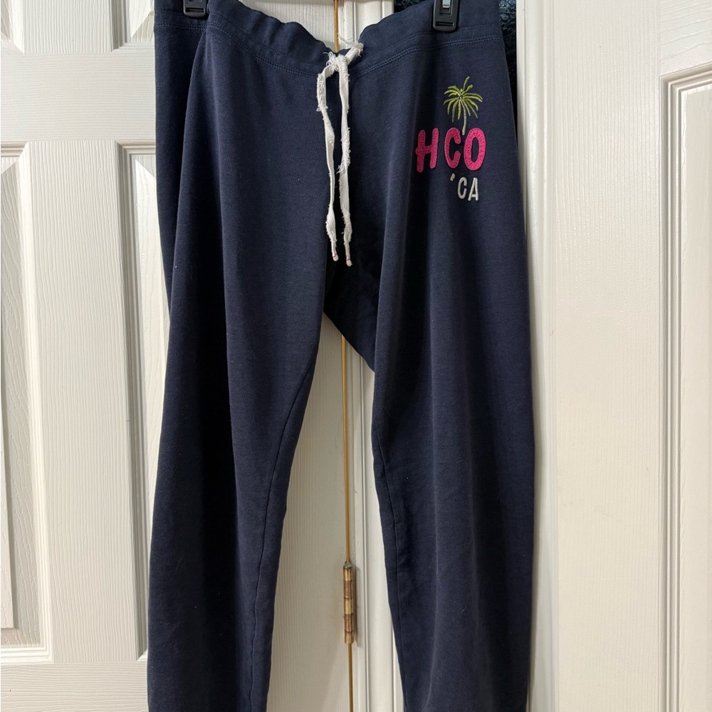 Hollister Navy Track Pants with Pink and Yellow Logo